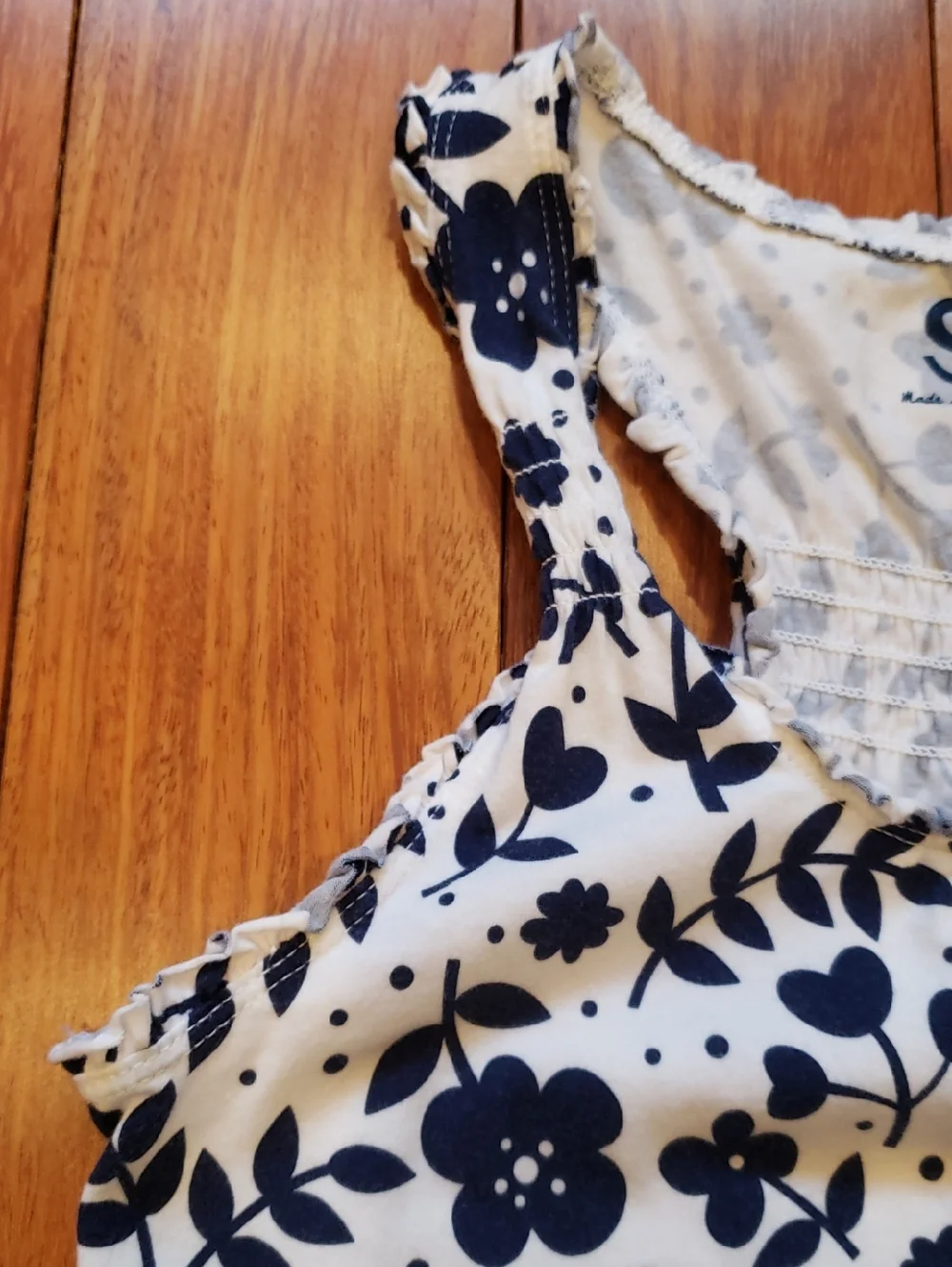 Small Floral Ruffle Racer Back tank top. White with blue - Picture 5 of 10
